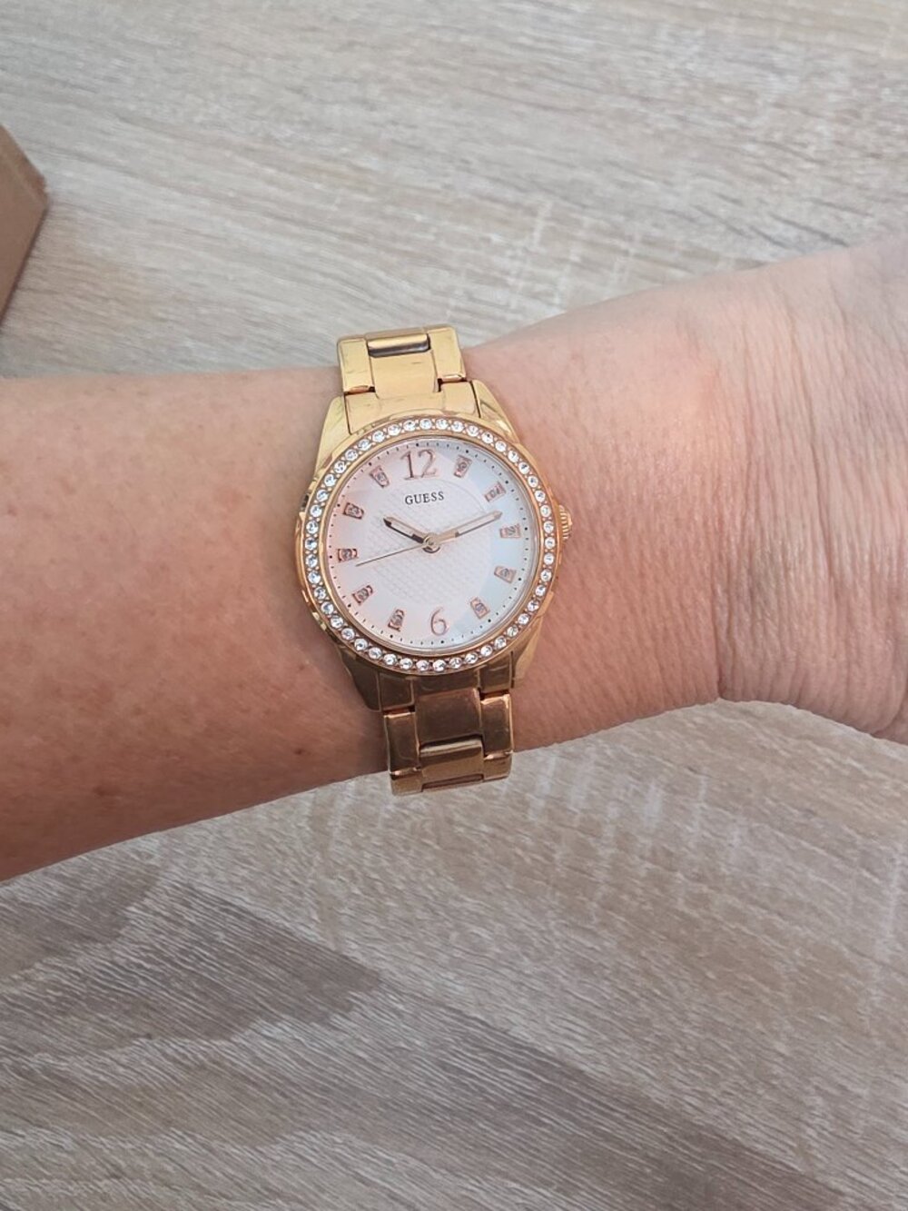 Guess Women's 27mm rose gold-tone stainless steel watch w/rhinestone bezel